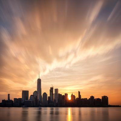 Sunrise behind the Lower Manhattan panorama