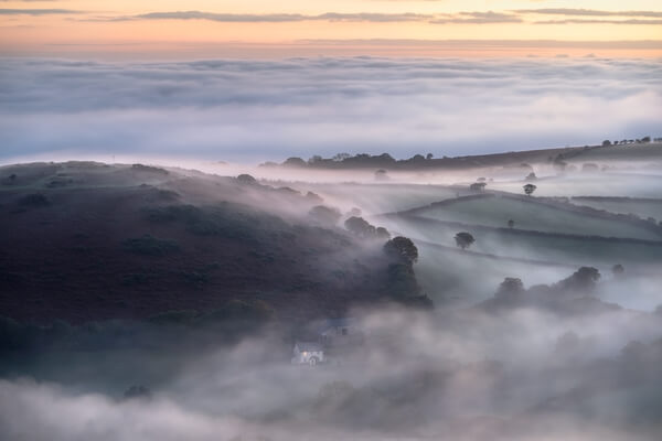 A view to Nattadon Hill on a spring sunrise during a temperature inversion.