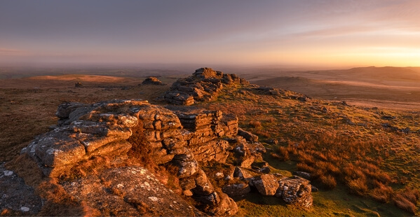 A late winter sunrise looking east of the most iconic stacks on the tor.
