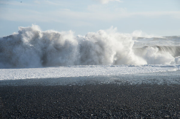 Fierce waves crashing onto the beach