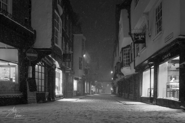 An empty Stonegate during a night time snowstorm