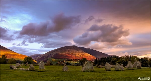 The Castlerigg Stone Circle near Keswick, with Blencathra mountain in the background, shot on an autumn morning.