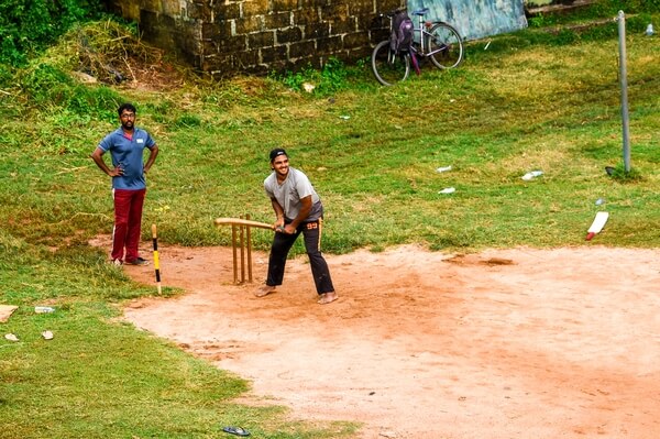A game of cricket, the passion of Lankans, inside the Fort. 