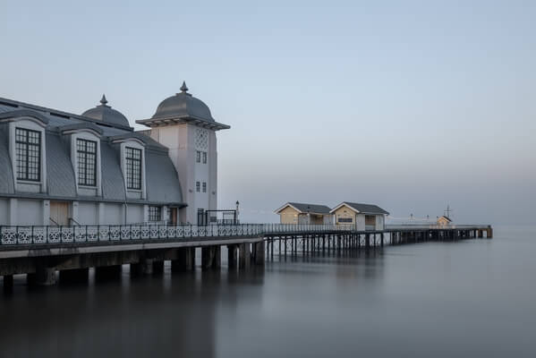 Penarth Pier, early in the morning with the tide in.  Slow shutter speed to smooth out the water.