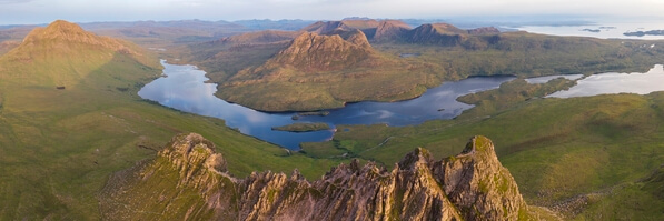 View from Stac Pollaidh looking south towards Loch Lurgainn at sunset
