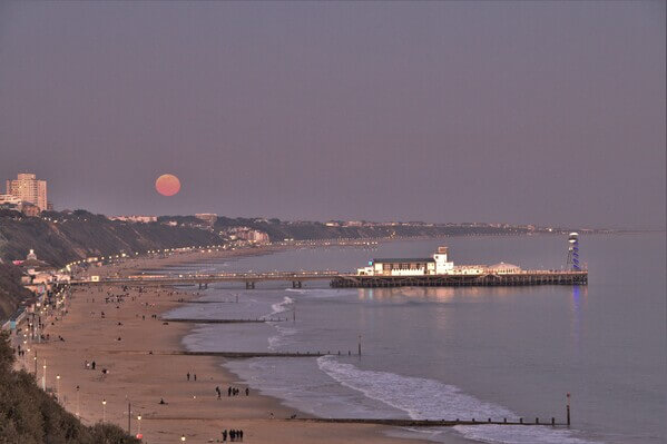 Bournemouth pier full moon.