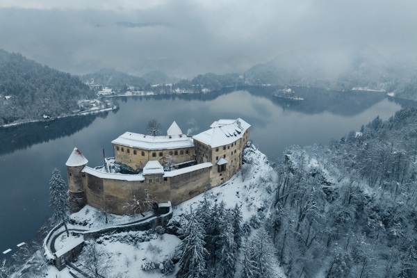 A drone shot of Lake Bled castle. Please note that it is illegal to fly a drone directly above the castle and above people. 