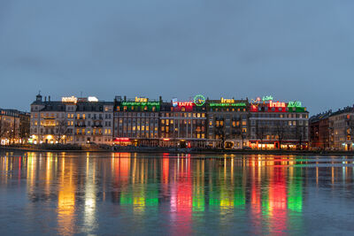 Neon signs across the Sortedam Sø