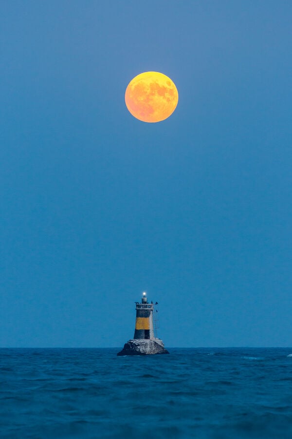 Pomorie lighthouse with Blue moon