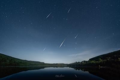Composite of several Perseid meteors over the reservoir