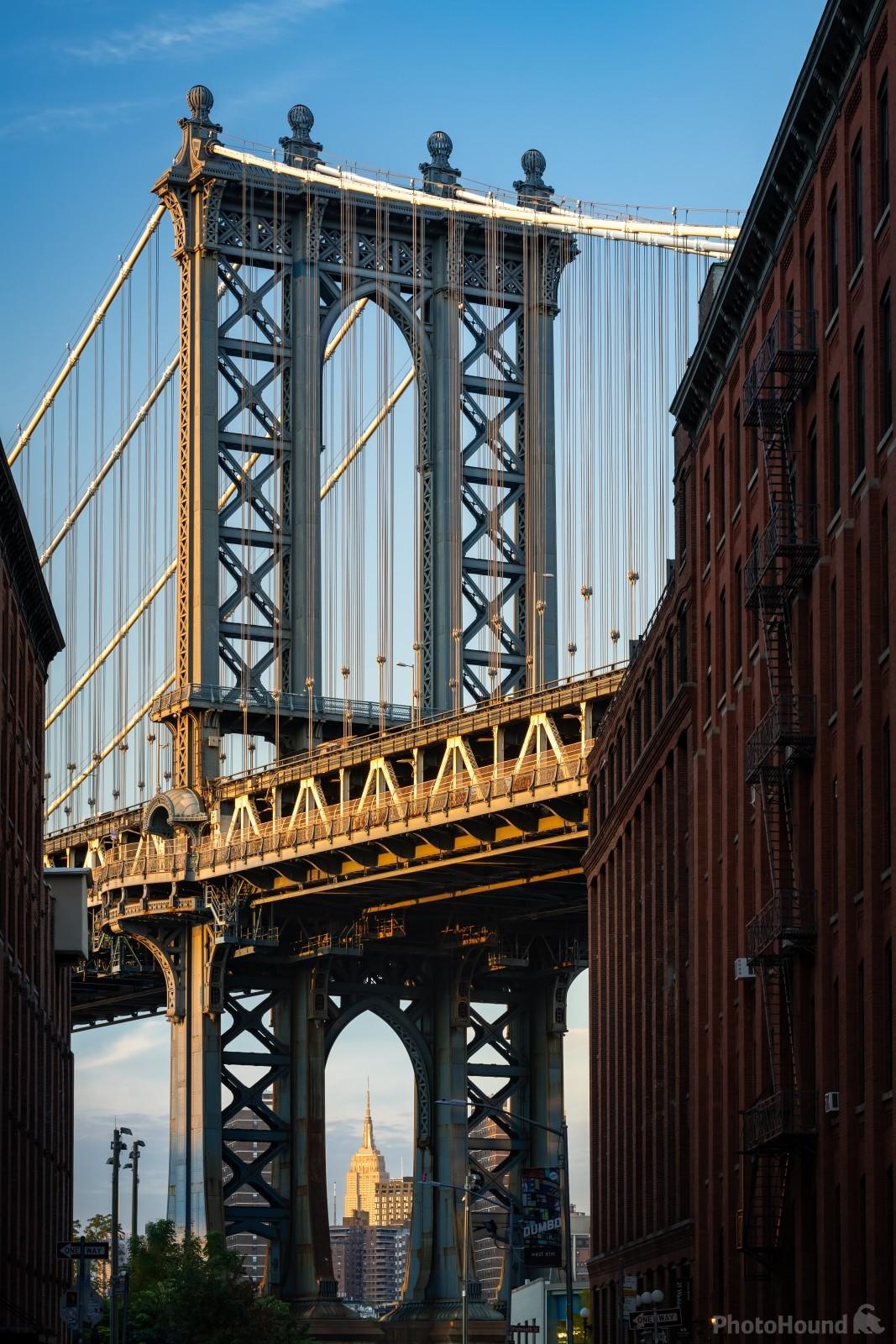 Image of Empire State Building view through the Manhattan Bridge by VOJTa Herout