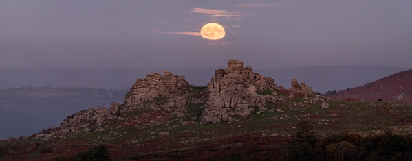 A view to Hound Tor, looking east, during a moonrise (during a mirage)