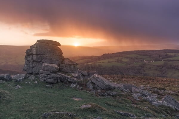 Late autumnal sunset on Yar Tor as a rain storm approaches.