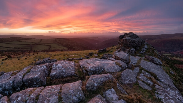A winter sunrise looking south east from the top of the tor.