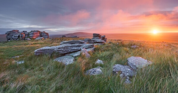 Some of the rock stacks at Wild Tor on a fsunrise in summer.