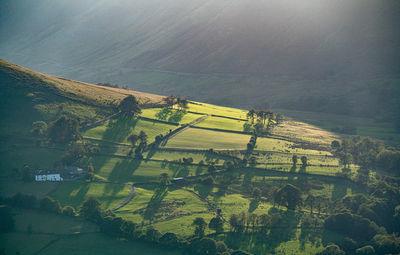 Light casting shadows in the fields of the Newlands Valley