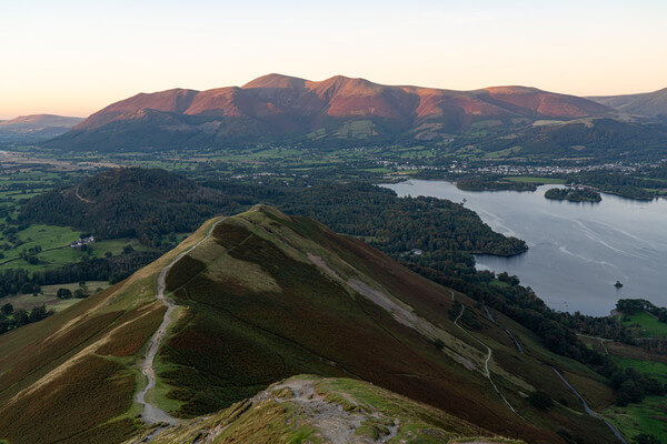 Last rays of sun catching the top of Skiddaw and Blencathra in the distance