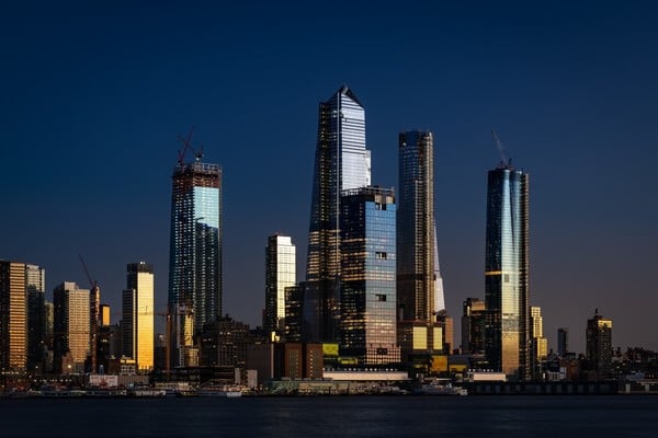 Hudson Yards at night, after the sunset still reflecting the bright sky