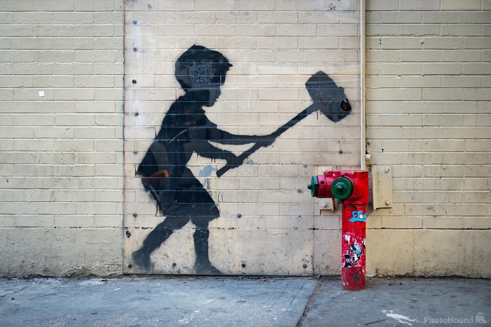 Image of Hammer Boy mural by Banksy by VOJTa Herout