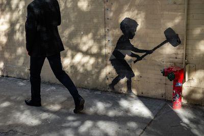 photos of New York City - Hammer Boy mural by Banksy
