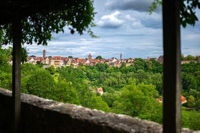 View of Rothenburg ob der Tauber framed with pergola