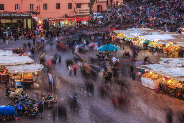 View of Jemaa el-Fna Square at dusk from Grand Balcon Cafe Glacier.
