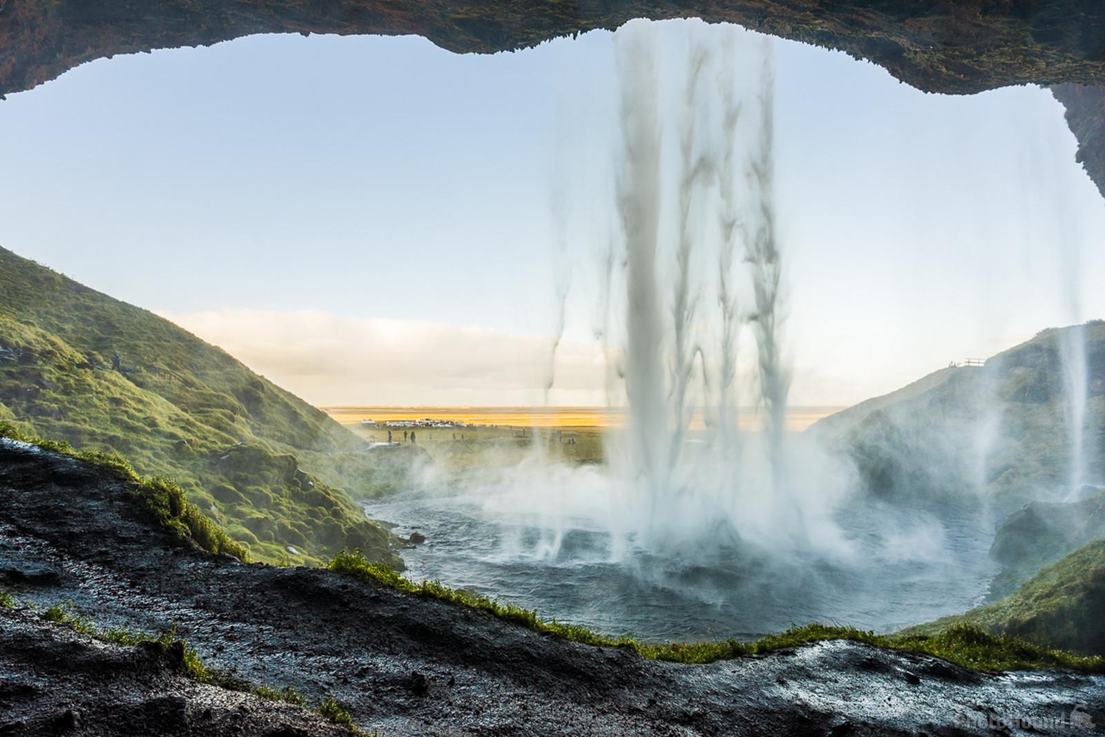 Image of Seljalandsfoss - walk behind the waterfall by James Billings.