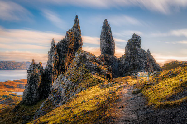 The popular Old Man of Storr on the Isle of Skye in Scottish Highlands captured in a daytime with some long exposure effect for additional movement.