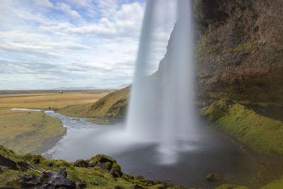 Seljalandsfoss waterfall from the path that runs behind the waterfall