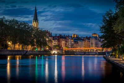Blue Hour on the Saone and the St-Georges district at Lyon view from the banks of Saone. 
In the background, you can see St George's Church and St George's Bridge.