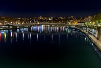 The Croix-Rousse district by night at Lyon view from the footbridgr of the courthouse.  
In the center of the photo, we can see the Church of the Bon-Pasteur, while on the far left we see the dome of the church of 