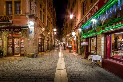 St-Jean street in the Old Lyon by night at the level of the square of Neuve - St-Jean. It is the main street of the St-Jean district, and one of the busiest of Lyon. Oriented north-south, it connects the square of the Change and the square of Saint-Jean.