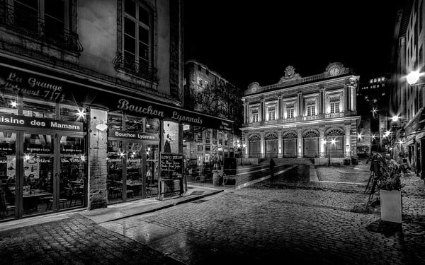 Square and temple of Change in the old Lyon in B/W. This square is located in the 5th arrondissement of Lyon and its name is given by the temple of exchange. It was built on plans by the architect Simon Gourdet between 1631 and 1653, then remodeled under the direction of Jacques-Germain Soufflot in 1748-1750. He has been assigned to Protestant worship since 1803.