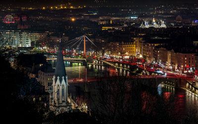 Lyon seen from Curiosités garden during the Festival of Lights. We can see in the foreground the church of St. George and the Bonaparte bridge on the Saone and in the background, the Chamber of Commerce and Industry and the opera of Lyon.