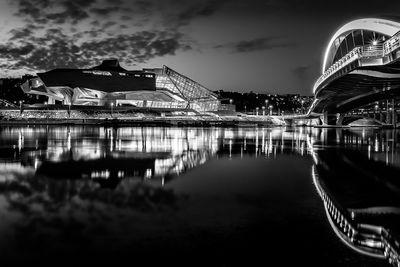 The Confluences museum and the Raymond Barre footbridge on the Rhone at Lyon in the Confluences district in B/W.