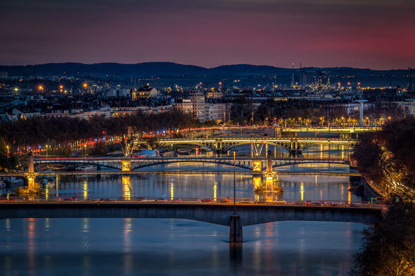 Blue Hour on the Bridges of the Rhone at Lyon and in the distance the Mount of Pilat.
