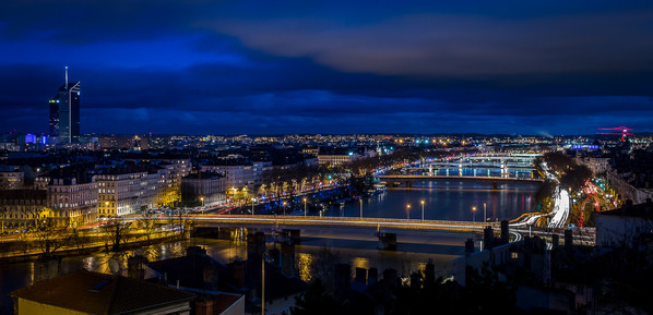 Bridges of the Rhone at Lyon by night. At the extrem left, we can see the towers of the Part Dieu distrct.