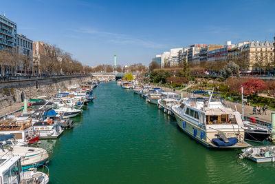Port de l'Arsenal in Paris. In the background, you can see the Colonne de Juillet located in the middle of the Place de la Bastille.