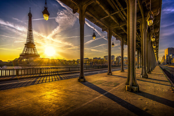 Sunrise on the Eiffel tower view from under the Pont de Bir-Hakeim.