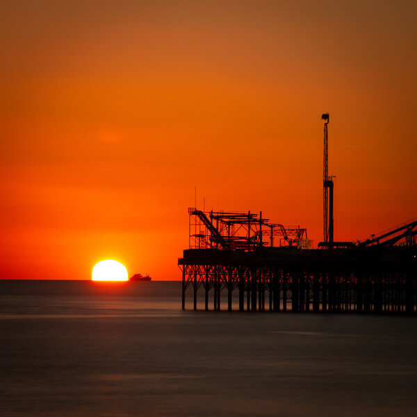 Setting summer sun on the Brighton horizon