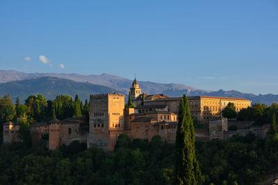 Nice blue skies and sunset shining on the walls of Alhambra