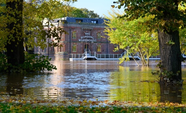 Looking across to the Bonding Warehouse across a flooded river