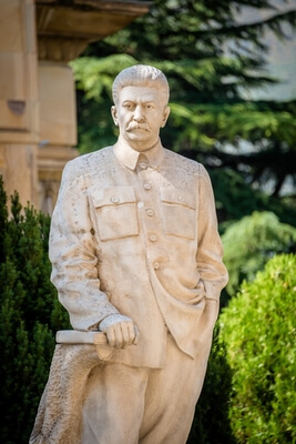 Statue portrait of Stalin outside of museum