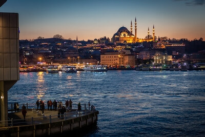 Süleymaniye Mosque photographed from Galata bridge using the platform for a foreground.