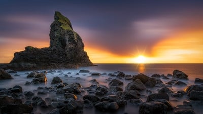 A very dramatic sunset from the Talisker Bay with a little bit of slow exposure used to capture the movement of the water.