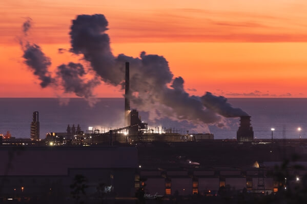View towards Port Talbot steelworks at sunset