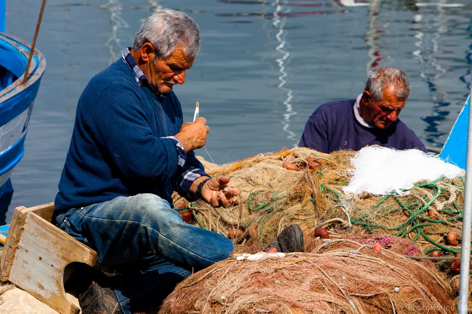 Image of Pozzuoli – Fish Market and Fisherman by the Port by Raimondo Giamberduca