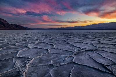 The polygons of raised salt are formed as salty water rises in capillary action between cracks in the salt flats, drying and hardening upon contact with the warm, dry air of Death Valley.