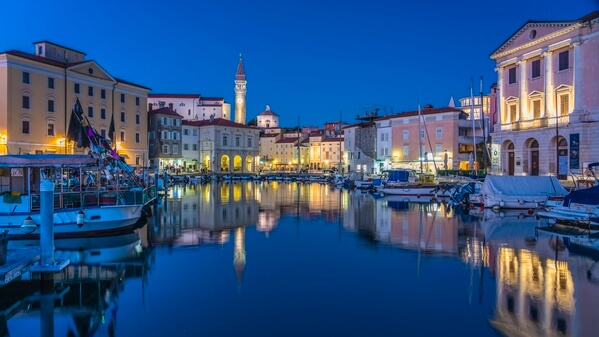Piran Harbour and reflections at blue hour.
