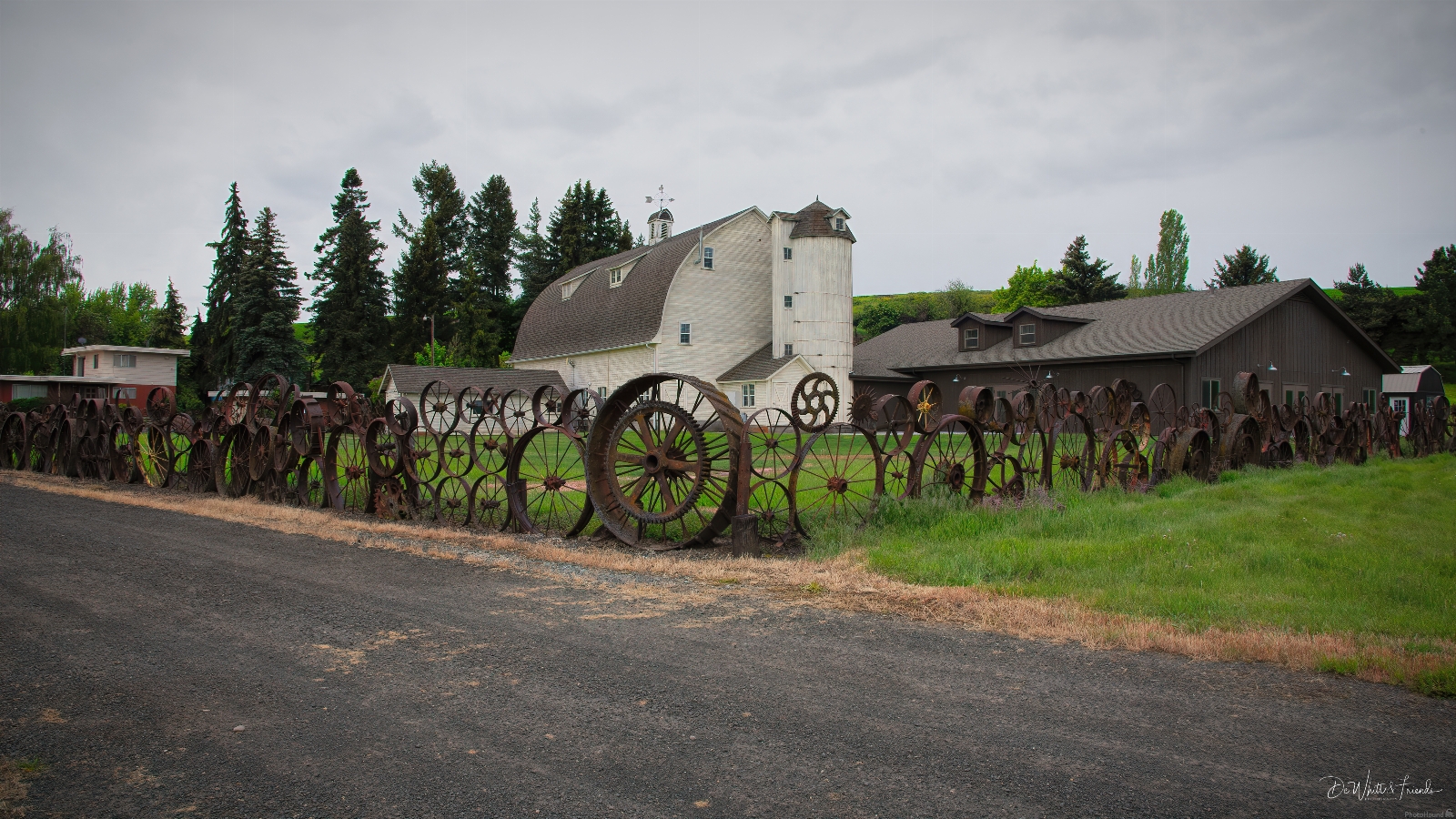 Image of Dahmen Barn and Wagon Wheel Fence by Dale DeWhitt